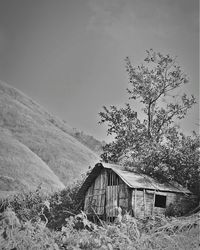 Abandoned built structure on landscape