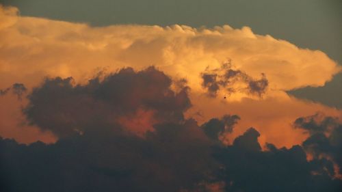 Low angle view of dramatic sky during sunset