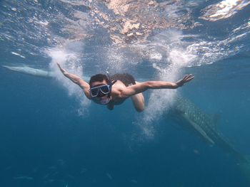 Man swimming in sea