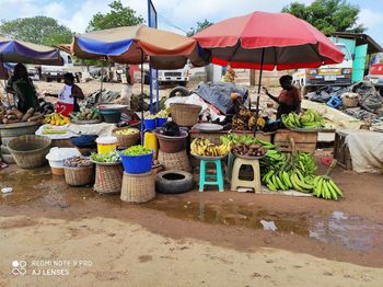 People at market stall