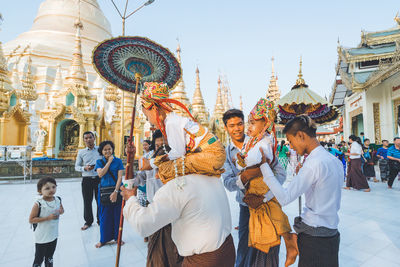 Group of people in front of building