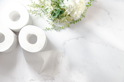 High angle view of white flowers on table