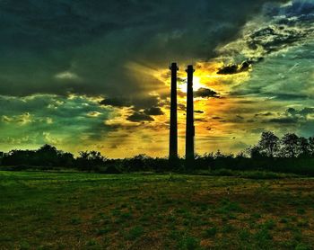 Scenic view of dramatic sky at sunset