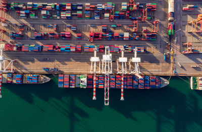 High angle view of boats on pier over canal