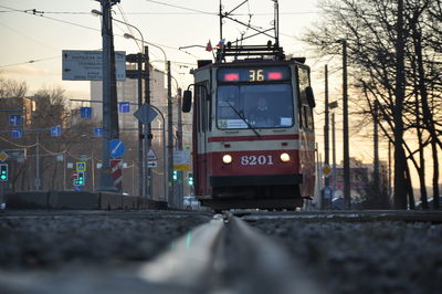 Train on railroad track against sky