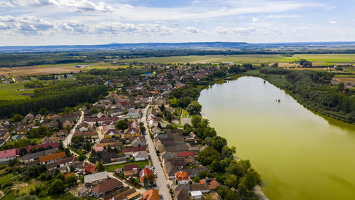 High angle view of river amidst buildings in city