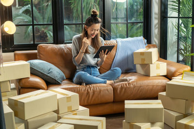 Portrait of woman using phone