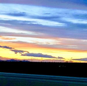 Scenic view of silhouette landscape against sky during sunset