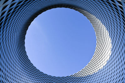 Low angle view of building against clear blue sky