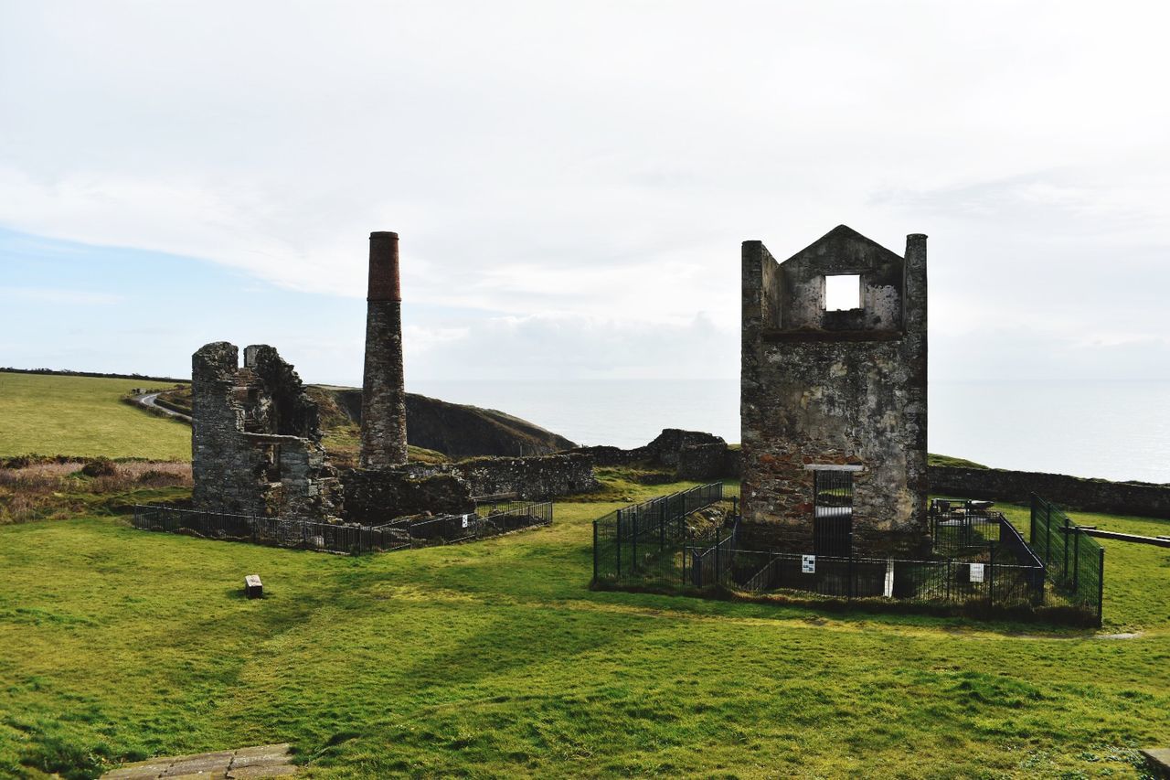 history, the past, old ruin, old, damaged, sky, grass, ancient, built structure, architecture, day, weathered, cloud - sky, memorial, cemetery, ancient civilization, no people, bad condition, abandoned, outdoors, field, gravestone, building exterior, nature