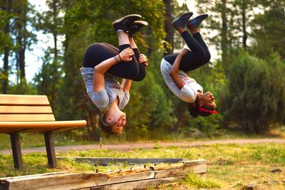 Young woman playing in park