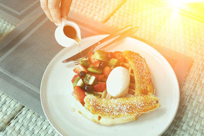 High angle view of breakfast in plate on table