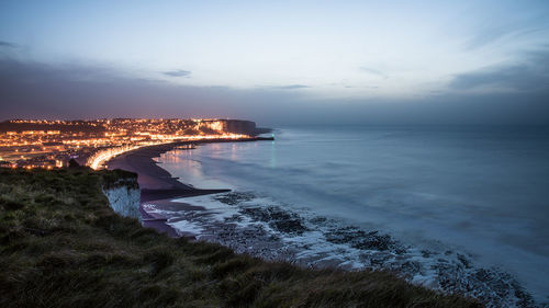 Scenic view of sea against cloudy sky