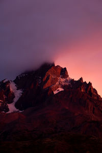 Scenic view of mountains against sky during sunset