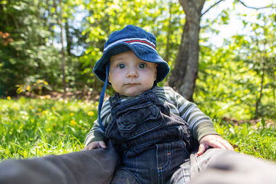 Portrait of baby sitting outdoors