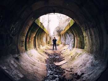 Woman in tunnel