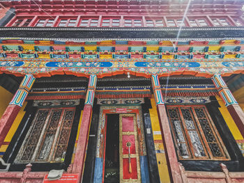 Low angle view of multi colored text on building