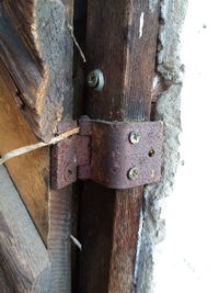 Close-up of padlock on metal door