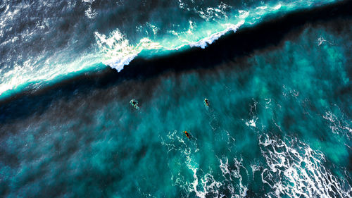 High angle view of bubbles over sea