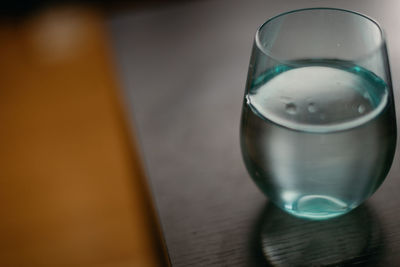 Close-up of water in glass on table