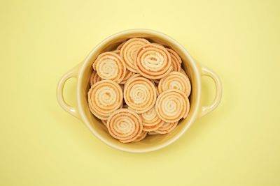 Directly above shot of coffee cup against white background