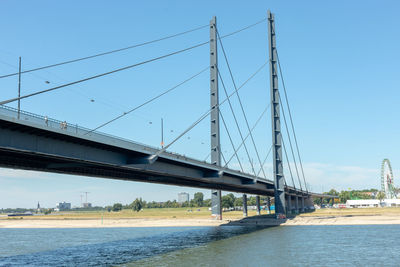 Bridge over river against sky