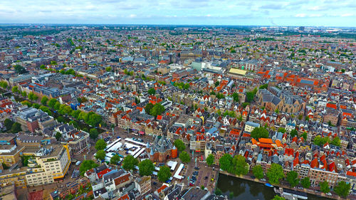 Aerial view of cityscape against sky