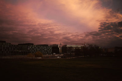 Buildings against sky during sunset