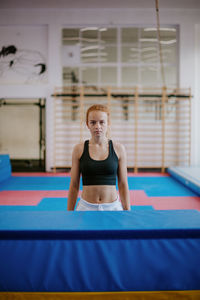 Portrait of confident woman in gym