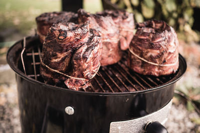 Close-up of meat on barbecue grill