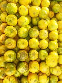 Full frame shot of lemons for sale at market stall
