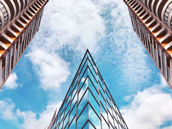 Low angle view of modern building against sky