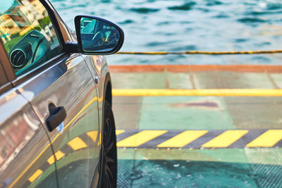 High angle view of reflection on side-view mirror