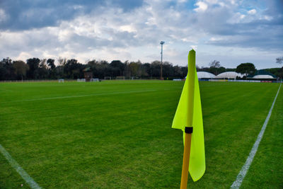 Scenic view of soccer field against sky