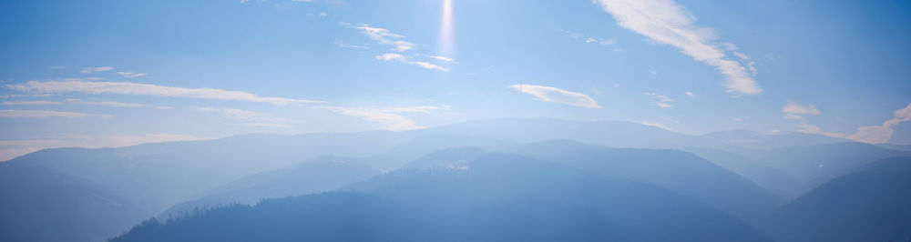 Sun over the winter mountains with snow, cindrel mountains, paltinis, romania