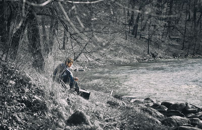 Man in forest during winter