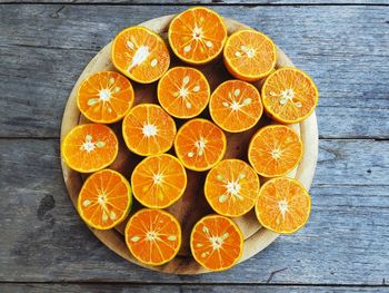 High angle view of orange fruits on table