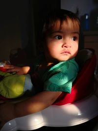 Portrait of cute baby at home