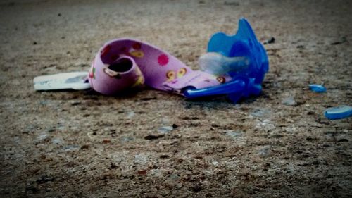 View of stuffed toy on sand