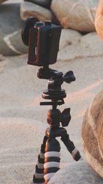 Close-up of action camera on tripod