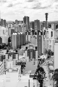 High angle view of buildings in city against sky