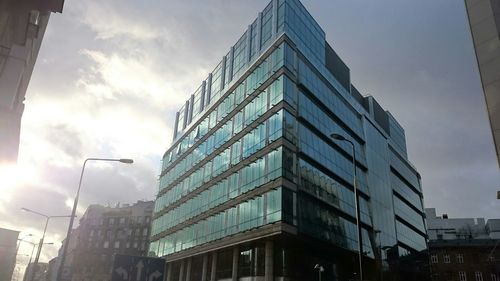 Low angle view of modern building against sky