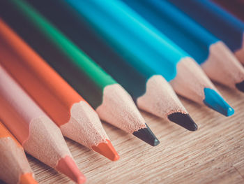 High angle view of colored pencils on table