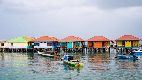 Boats moored in sea