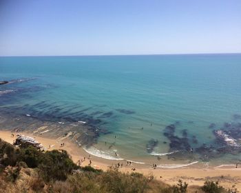 Scenic view of sea against clear blue sky