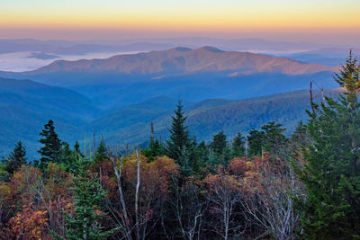 Scenic view of mountains against sky during sunset
