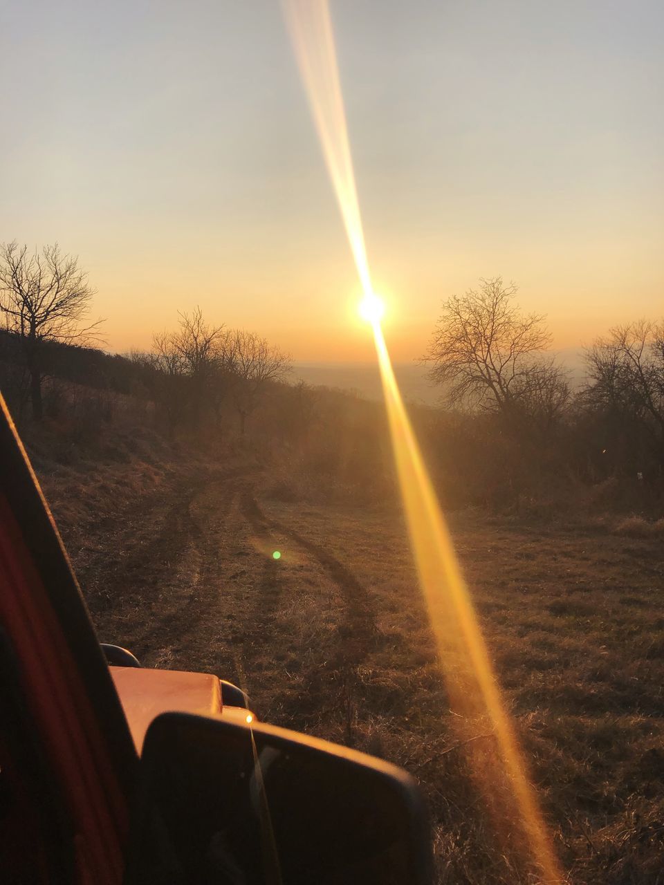 SCENIC VIEW OF LANDSCAPE AGAINST SKY DURING SUNSET