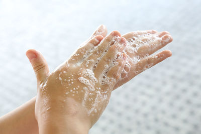 Low section of person wearing shoes