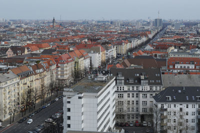 High angle view of buildings in city against sky