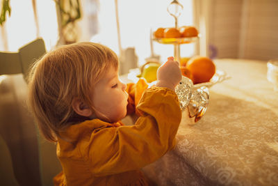 Girl looking at camera at home